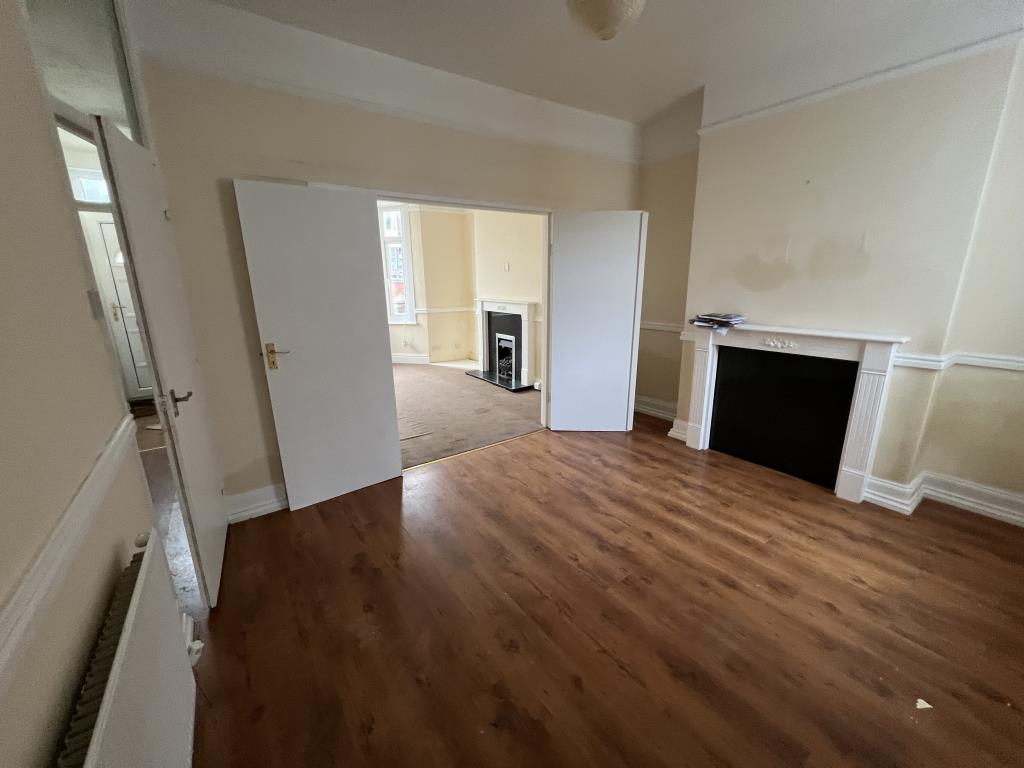Lot: 13 - TWO-BEDROOM TERRACE HOUSE WITH GARDEN - General view of through dining room